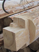 Рубка в лапу с коренным шипом